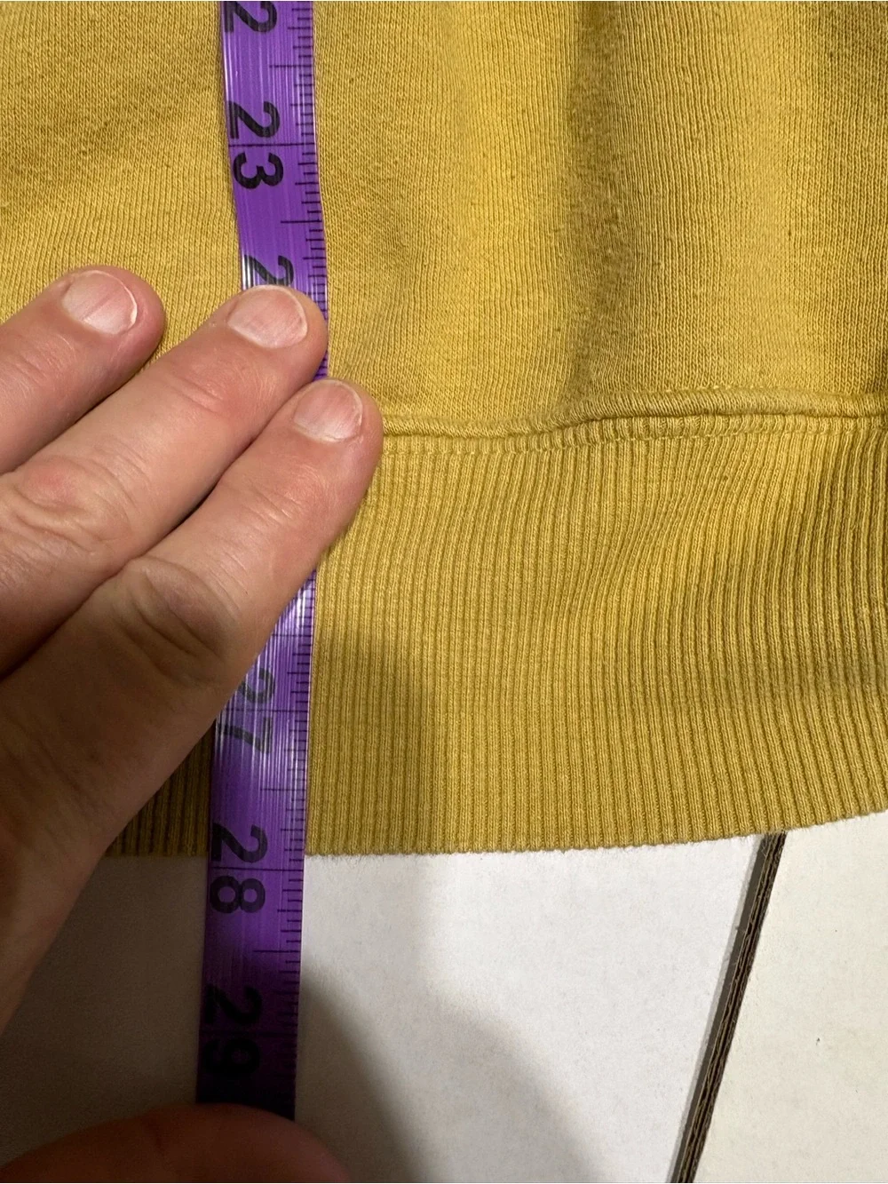 The North Face Mustard Pullover Hoodie with mountain outdoors scenery